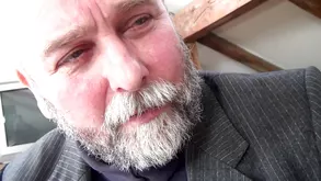 Cute girl in mesh and leather corset exposing her enticing features