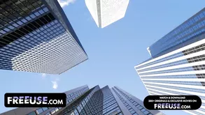 A woman in a police uniform is shaking her ass