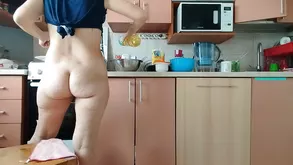 A beautiful woman in sexy lingerie waits for her man to come back home