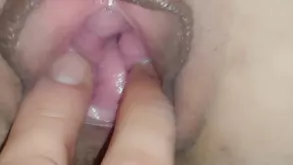 Blonde in sexy outfit struggles to carry heavy objects seeking help from a strong man