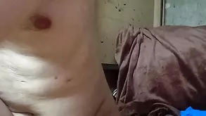 A seductive brunette teaches yoga to her new client