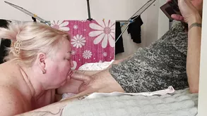 Pretty babe prepares a cock for her oncoming guest