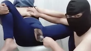 The hot beauty in black underwear is undressing slowly