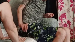 A young girl in lingerie seduces her lover on the couch