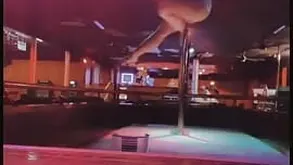 A sexy brunette shakes big tits at the camera in a hot porno