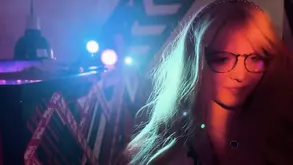 Brunette babe posing on the sofa with an assless kimono