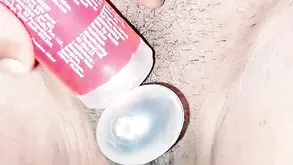 Beautiful girl masturbating with a purple sex toy