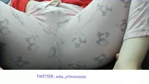 A blonde girl introduces herself and undresses slowly