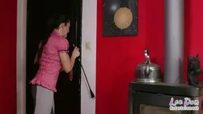 A lesbian couple tie each other with latex and play with a strapon