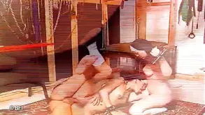 Femdom mistress whips her slave in the basement of her house